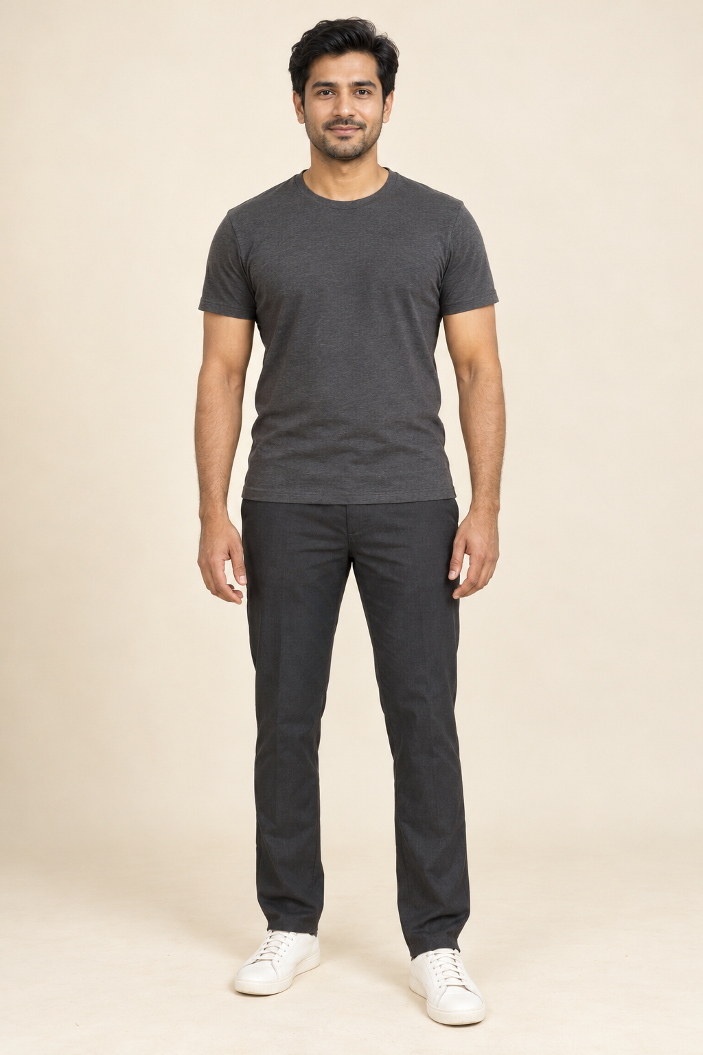 Fictional adult model standing in a plain dark shirt